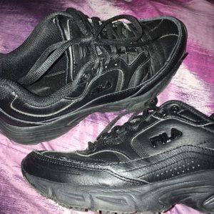 Size 7 black fila shoes.
